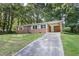 Traditional brick home with a covered carport and a sprawling green lawn at 804 Brookdale Sw Dr, Atlanta, GA 30315