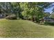 Large front yard with a small home on a hill at 804 Brookdale Sw Dr, Atlanta, GA 30315