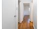 Hallway with hardwood floors and white doors at 804 Brookdale Sw Dr, Atlanta, GA 30315
