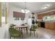 Light-filled laundry room with tile flooring, a window, and modern appliances at 804 Brookdale Sw Dr, Atlanta, GA 30315