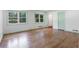 Bright living room featuring hardwood floors and two large windows at 804 Brookdale Sw Dr, Atlanta, GA 30315