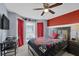 Cozy bedroom with plush carpet, ceiling fan, and stylish decor at 1010 San Marcos Cv, Lawrenceville, GA 30043