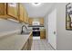 Functional kitchen with ample counter space, modern appliances, and natural light at 1010 San Marcos Cv, Lawrenceville, GA 30043