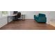 Versatile living area with hardwood floors and natural light, ideal for an office at 114 Brackley Dr, Cumming, GA 30040