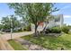 Lovely home with two-car garage, manicured lawn, and inviting entrance with stairs, close to street at 1910 Towne Park Dr, Mcdonough, GA 30252