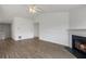 Comfortable living room with hardwood floors, a fireplace, and plenty of room for relaxation and enjoyment at 1910 Towne Park Dr, Mcdonough, GA 30252