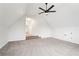 Bonus room featuring carpet floors, ceiling fan, and ample natural light at 4508 Meadow Vista Trce, Lithonia, GA 30038