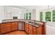 Kitchen with granite countertops, stainless steel appliances and view into great room at 4508 Meadow Vista Trce, Lithonia, GA 30038