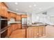 Spacious kitchen with stainless steel appliances, hardwood cabinets, granite countertops, and breakfast bar at 4508 Meadow Vista Trce, Lithonia, GA 30038