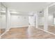 Spacious living room features door leading to staircase at 4508 Meadow Vista Trce, Lithonia, GA 30038