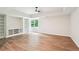Bright living room features wood-look flooring, recessed lighting, and window at 4508 Meadow Vista Trce, Lithonia, GA 30038
