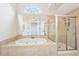 Luxurious soaking tub and glass shower in the main bathroom at 4508 Meadow Vista Trce, Lithonia, GA 30038