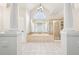 Elegant main bathroom with a large tub, separate shower, and vanity at 4508 Meadow Vista Trce, Lithonia, GA 30038