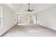 Spacious main bedroom featuring tray ceilings and a ceiling fan at 4508 Meadow Vista Trce, Lithonia, GA 30038