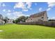 Expansive backyard featuring a wooden fence and lush green grass at 98 Concord Pl, Hiram, GA 30141