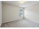 Bedroom with light gray walls, carpet, and a window at 98 Concord Pl, Hiram, GA 30141