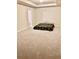 A carpeted bedroom has a bed, two windows, and a door at 98 Concord Pl, Hiram, GA 30141