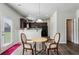This bright dining area is conveniently located next to the kitchen at 98 Concord Pl, Hiram, GA 30141