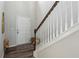 Inviting foyer featuring staircase and neutral paint, a welcoming entrance for guests at 98 Concord Pl, Hiram, GA 30141