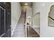 Bright foyer with staircase and laminate wood flooring at 98 Concord Pl, Hiram, GA 30141