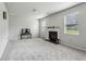 Spacious living room features a fireplace and large windows at 98 Concord Pl, Hiram, GA 30141