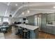 Open floorplan kitchen featuring a center island with bar stool seating and stainless steel appliances at 2155 Cove Trl, Cumming, GA 30041