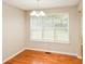 Dining room with hardwood floors, natural light, and overhead chandelier at 4150 Sterling Pointe Dr, Douglasville, GA 30135