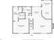 First floor plan featuring a primary suite with bathroom and closet, kitchen, living room, and dining area at 4150 Sterling Pointe Dr, Douglasville, GA 30135