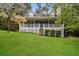 Charming home with a spacious front porch and beautifully maintained lawn, perfect for outdoor enjoyment at 4150 Sterling Pointe Dr, Douglasville, GA 30135