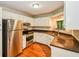 Well-equipped kitchen featuring stainless steel appliances, ample cabinet space, and stylish countertops at 4150 Sterling Pointe Dr, Douglasville, GA 30135