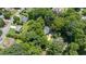 Lush aerial view showcases a home nestled among mature trees, offering a private, verdant setting at 837 Pine Ridge Dr, Lawrenceville, GA 30043