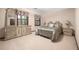 Serene bedroom with two large windows and a charming dresser at 837 Pine Ridge Dr, Lawrenceville, GA 30043