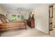 Bedroom with classic furnishings and plush carpet, offering a comfortable retreat at 837 Pine Ridge Dr, Lawrenceville, GA 30043