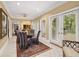 Breakfast nook with an ornate rug and bright windows at 837 Pine Ridge Dr, Lawrenceville, GA 30043