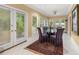 Charming breakfast nook featuring a glass-top table and bright natural light at 837 Pine Ridge Dr, Lawrenceville, GA 30043