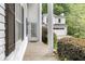 View of front porch showing entrance to home plus the bonus room above the attached garage at 837 Pine Ridge Dr, Lawrenceville, GA 30043