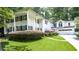 A two-story home with white siding, black shutters, and a well-manicured front yard at 837 Pine Ridge Dr, Lawrenceville, GA 30043