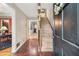 Inviting foyer with hardwood floors, a staircase, and views into adjoining rooms at 837 Pine Ridge Dr, Lawrenceville, GA 30043