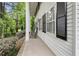 Relaxing front porch with rocking chairs at 837 Pine Ridge Dr, Lawrenceville, GA 30043