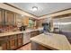 Traditional kitchen with stainless steel appliances and an island at 837 Pine Ridge Dr, Lawrenceville, GA 30043
