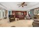 Spacious living room with built-in shelving and a cozy fireplace feature at 837 Pine Ridge Dr, Lawrenceville, GA 30043