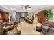 Spacious living room with a stone fireplace and an inviting sitting area at 837 Pine Ridge Dr, Lawrenceville, GA 30043