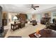 Open living room with natural light and multiple seating areas at 837 Pine Ridge Dr, Lawrenceville, GA 30043