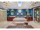 Lavish bathroom with a garden tub, elegant vanities, and a bright skylight at 837 Pine Ridge Dr, Lawrenceville, GA 30043