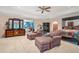 Expansive primary bedroom features sitting area, and serene neutral color palette at 837 Pine Ridge Dr, Lawrenceville, GA 30043