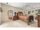 Spacious main bedroom featuring an eclectic design, natural light, and a charming hanging chair at 837 Pine Ridge Dr, Lawrenceville, GA 30043