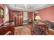 Charming office space with wood floors, classic decor, and custom built-ins at 837 Pine Ridge Dr, Lawrenceville, GA 30043