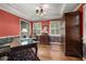 Bright home office with hardwood floors, ample storage, and comfortable seating at 837 Pine Ridge Dr, Lawrenceville, GA 30043
