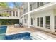 Backyard pool featuring clear blue water and multi-level decks and a multi-story home at 837 Pine Ridge Dr, Lawrenceville, GA 30043