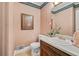 Cozy half bathroom with stylish wallpaper and modern fixtures at 837 Pine Ridge Dr, Lawrenceville, GA 30043